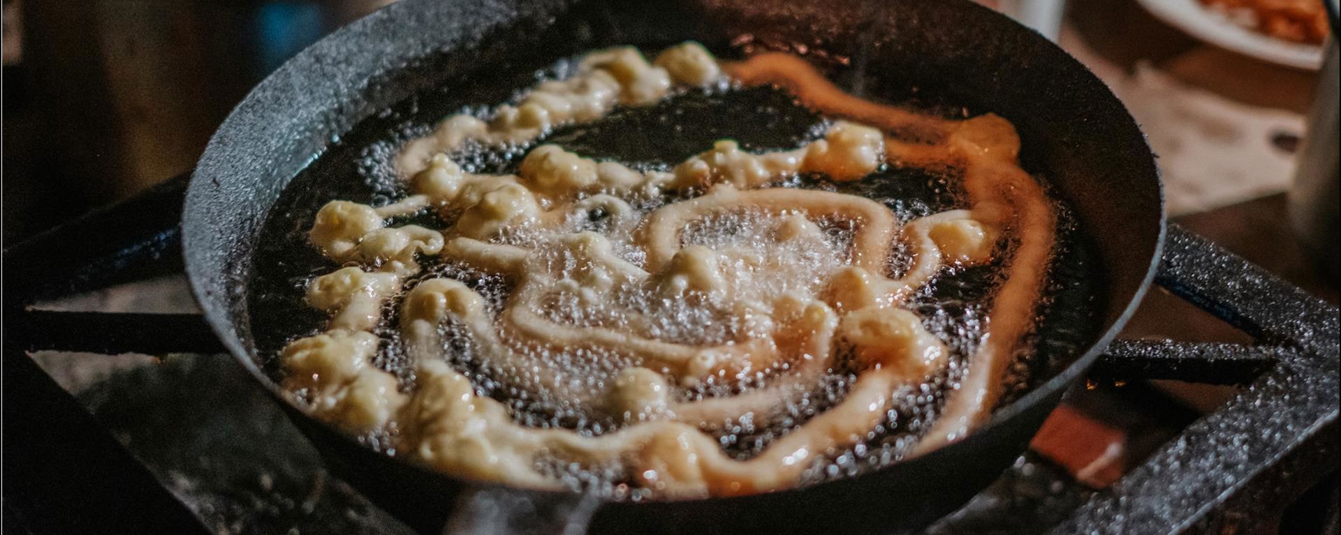 Strauben are fried in hot oil