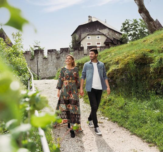 A couple is taking a stroll