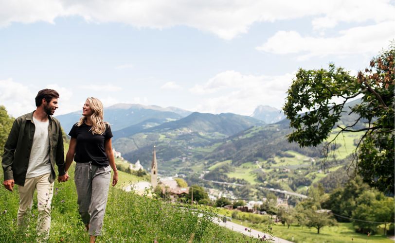 A couple on a hike in summer