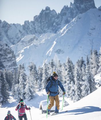 Three people on a ski tour