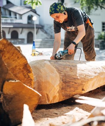 A female wood carver at work