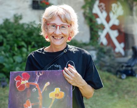 A woman with a painting