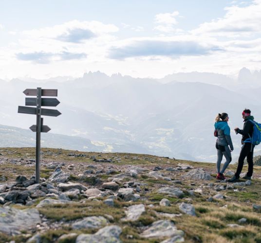 Two hikers enjoy the view