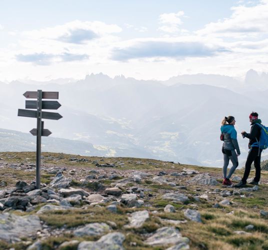 Two hikers enjoy the view