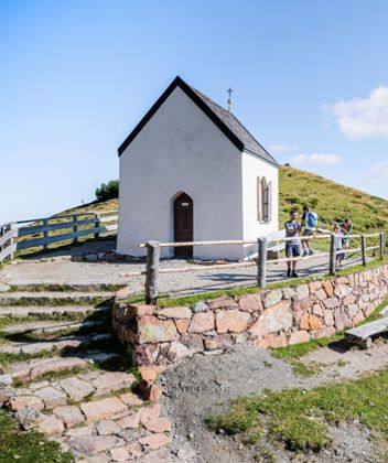 A family at the Totenkirchl church