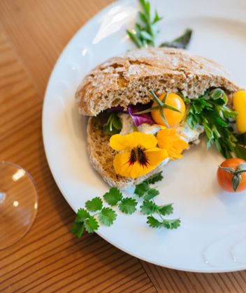 Bread with butter and fresh herbs