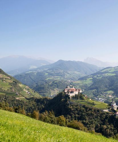 View on the Säben Monastery and the mountains in summer