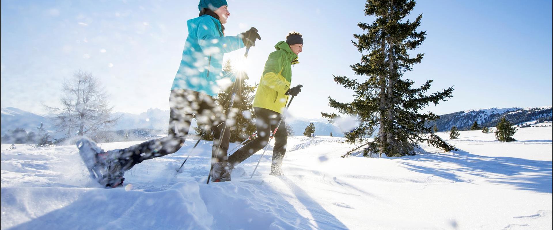 Two people on a snowshoe hike